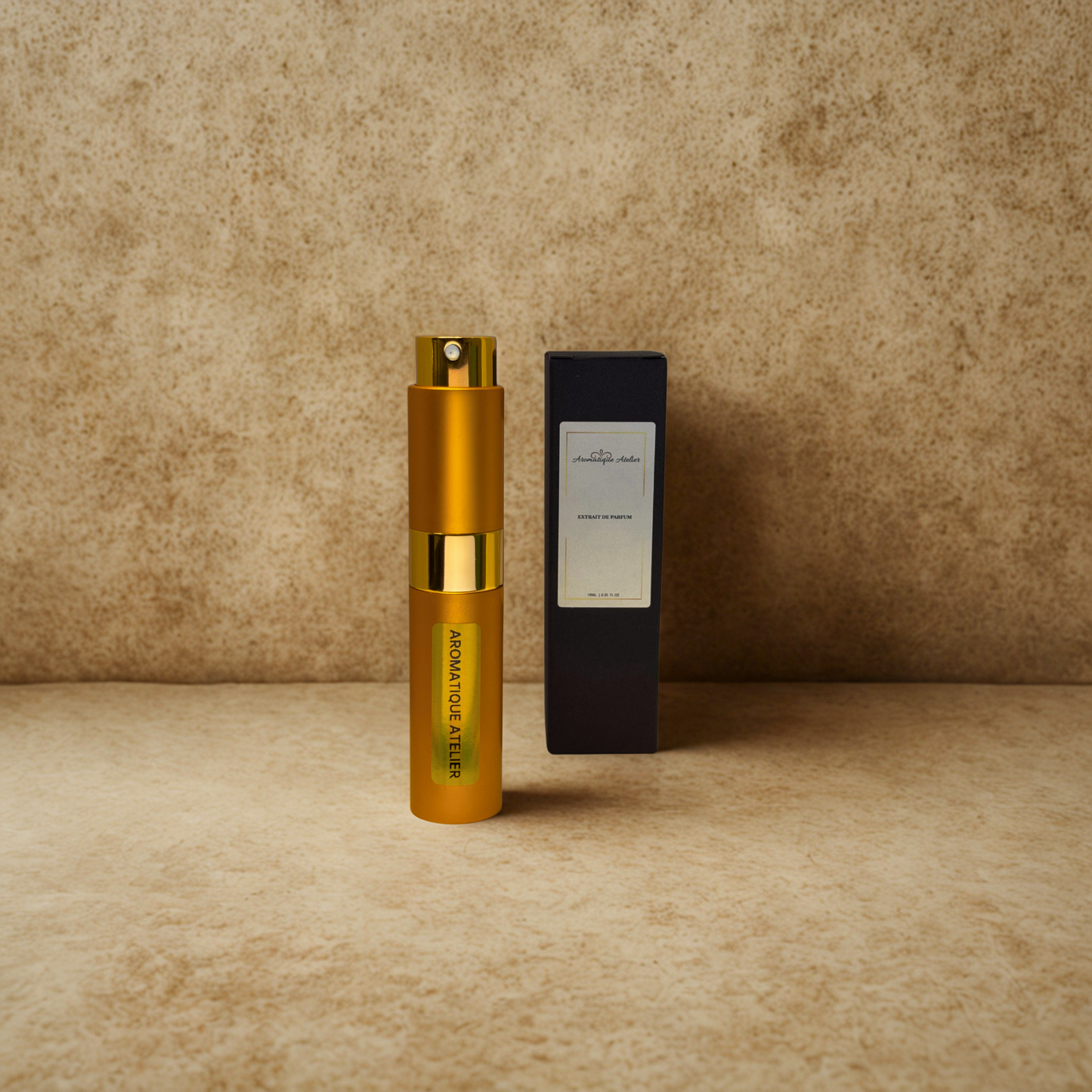 Aromatique Atelier Travel Perfume 10ML bottle with black packaging on beige background