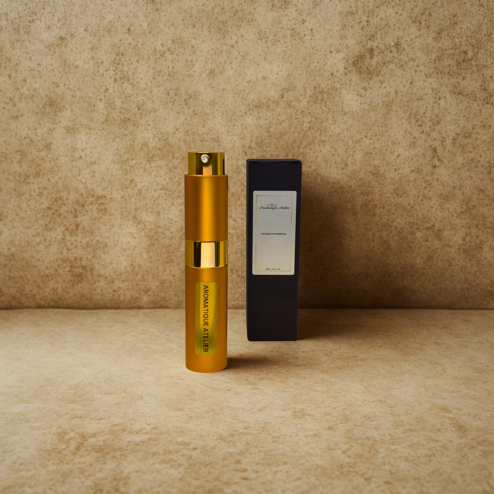 Aromatique Atelier Travel Perfume 10ML bottle with black packaging on beige background