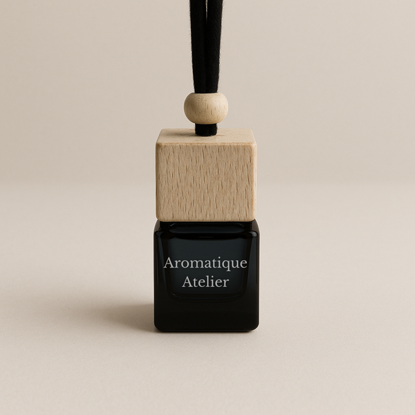 Car Diffuser Hanger with minimalist glass bottle and natural wooden cap hanging on black string
